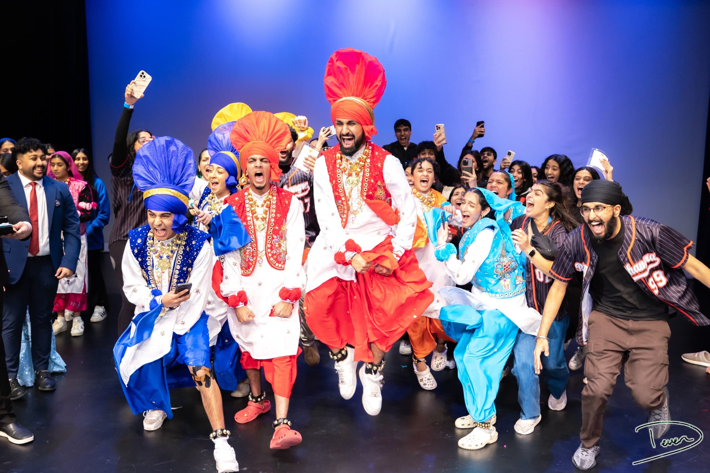 Dancers celebrating on stage at Vice City Showdown